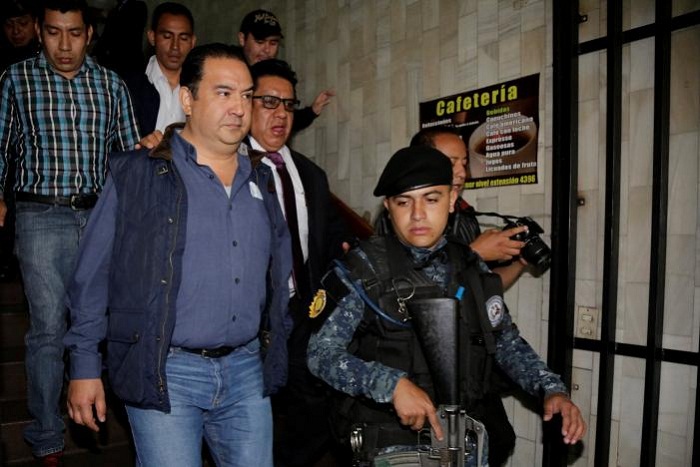 Guatemala president`s brother, son held on suspicion of fraud